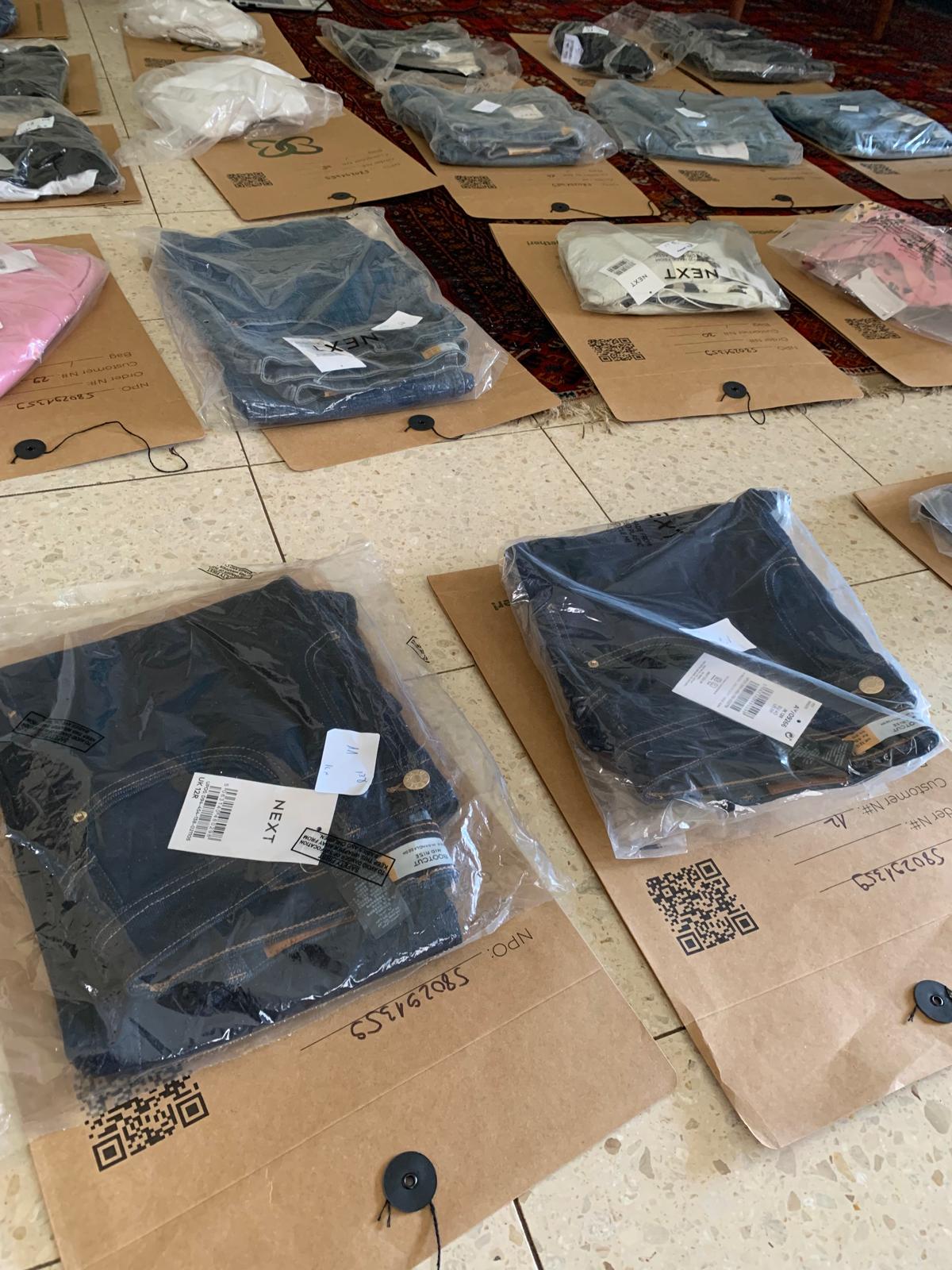 Sorted clothes on ReSource envelopes